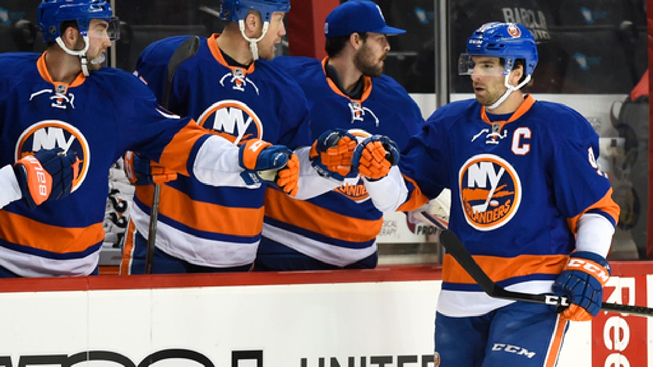 Hickey scores in OT, Islanders beat Flames 2-1